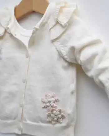 Knit kompletić NipperLand "Cvetići" (bež)