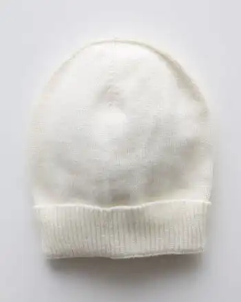 Knit kompletić NipperLand "Cvetići" (bež)