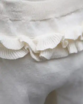 Knit kompletić NipperLand "Cvetići" (bež)